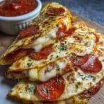 Crispy pepperoni pizza quesadillas with marinara sauce